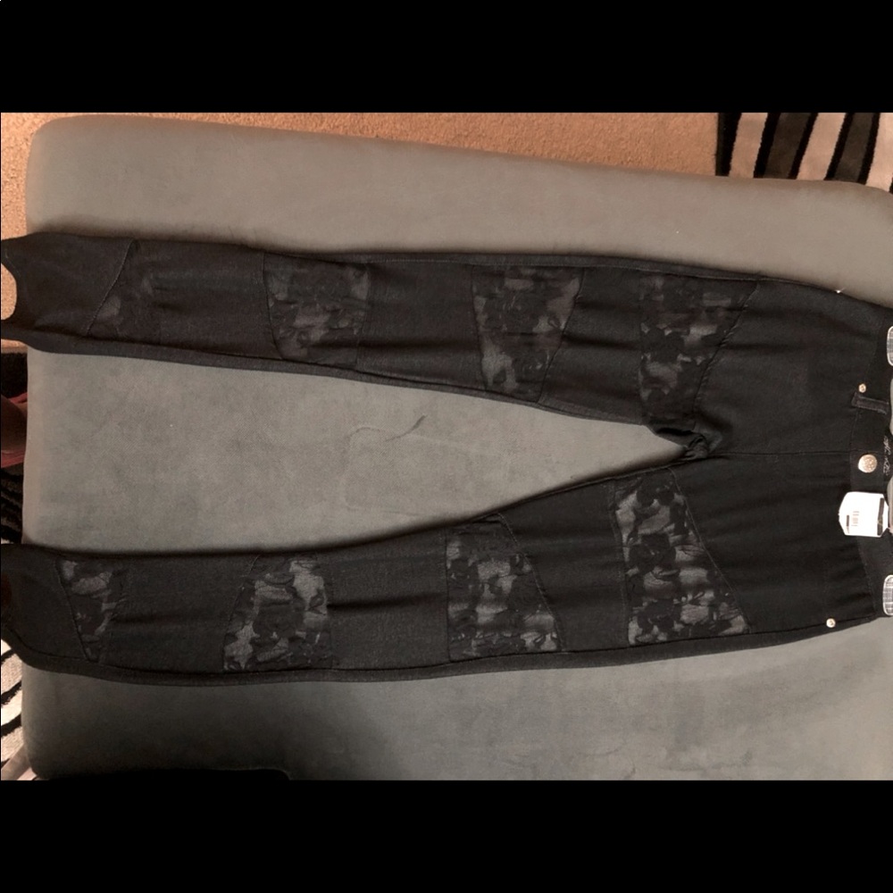 Black leggings with lace cutouts